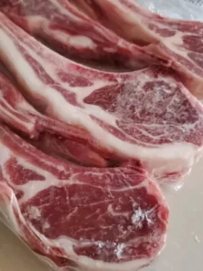 Thick-cut, tender baby lamb tomahawks from Inner Mongolia. 3KG frozen bone-in pack, no additives. Clean, milky-fresh flavour. U.S.-wide cold-chain delivery photo review